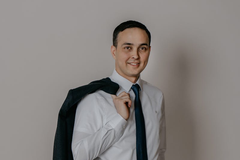 Skilled pizza artisan stretching dough with expertise