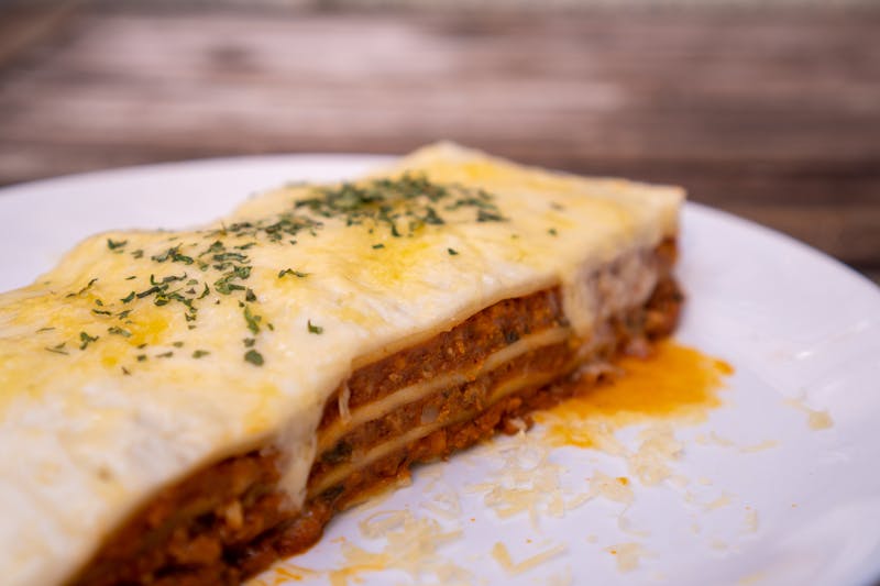 Baked lasagna with layers of cheese and meat